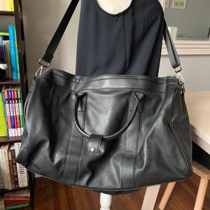 Faux black leather travel duffle bag